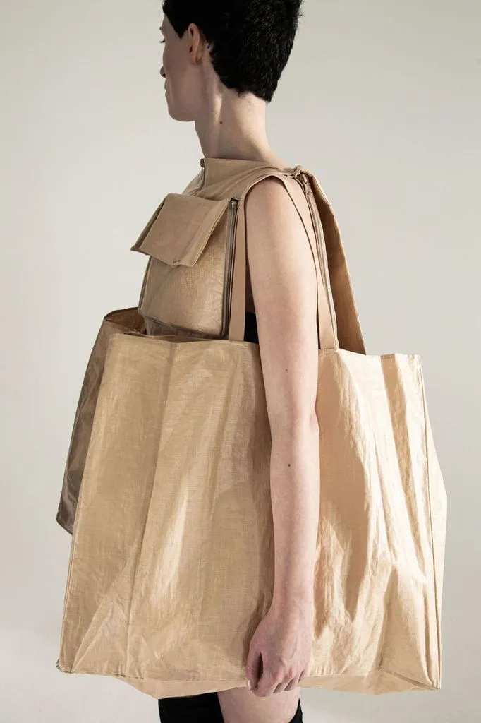 CONTAINER 5 -way transforming piece: dress / vest